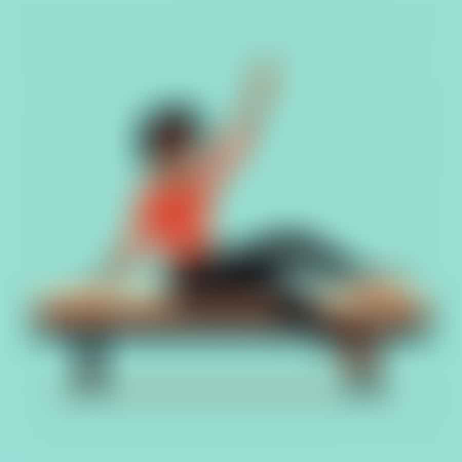 Person lifting their legs and upper body off a Pilates mat